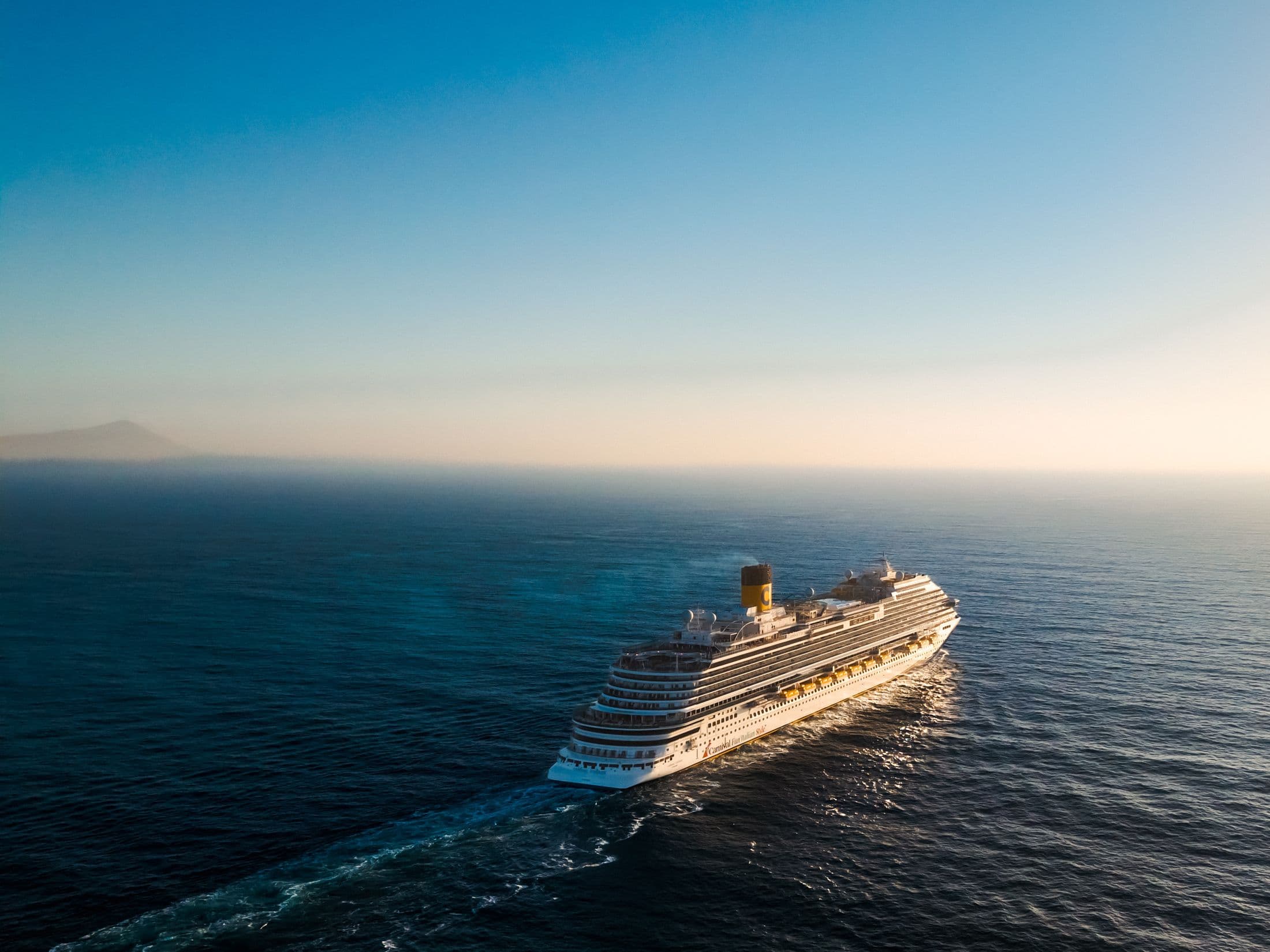 A journey at sea at sunset